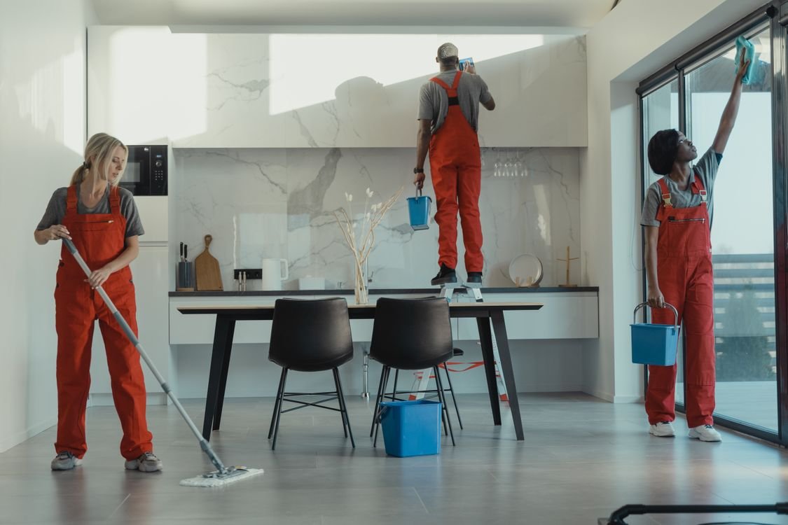 Professional commercial cleaner working in a Reading business office